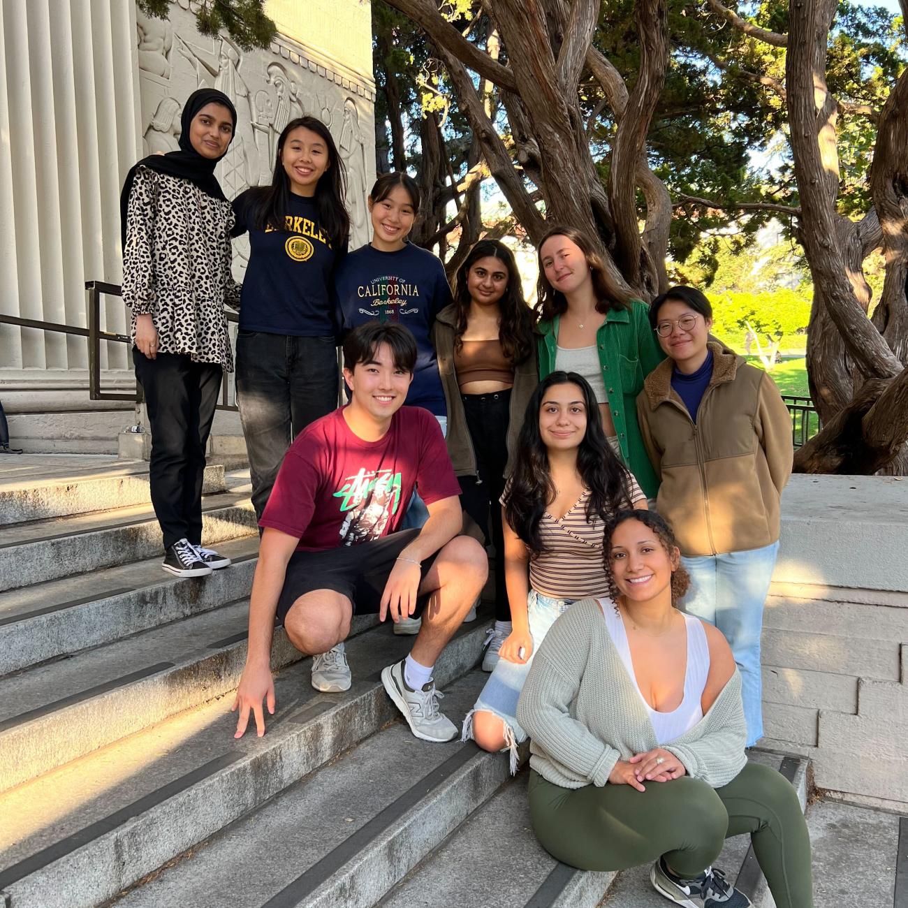 Group picture of 9 Data Science Peer Advisors on steps in front of VLSB building.