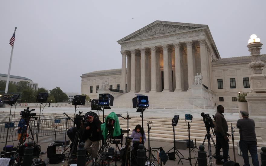 TV camera crews station in front of the Supreme Court building on Tuesday in Washington, D.C. Anna Moneymaker/Getty Images