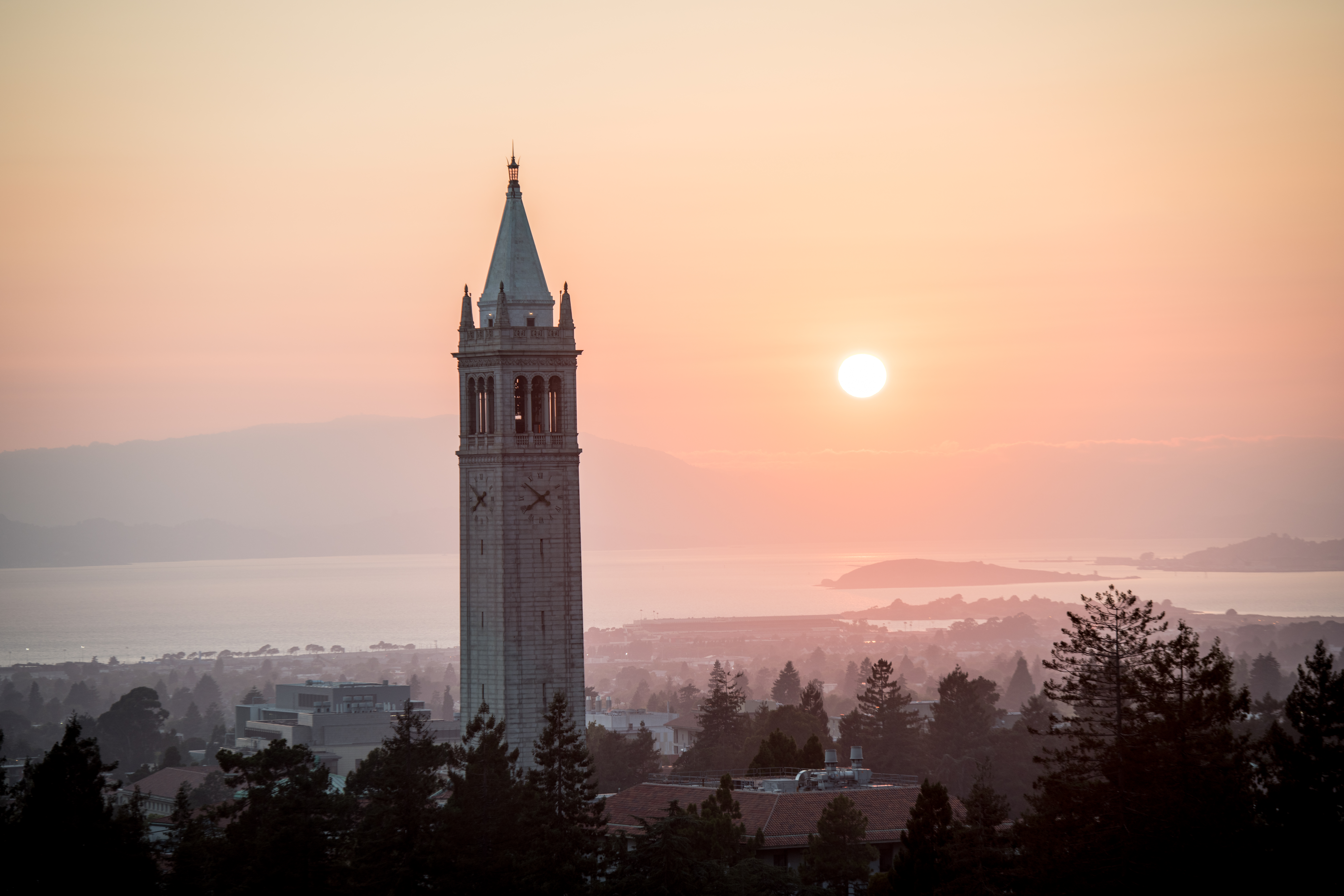 Sather Tower and the bay at sunset. (Photo/ Keegan Houser)
