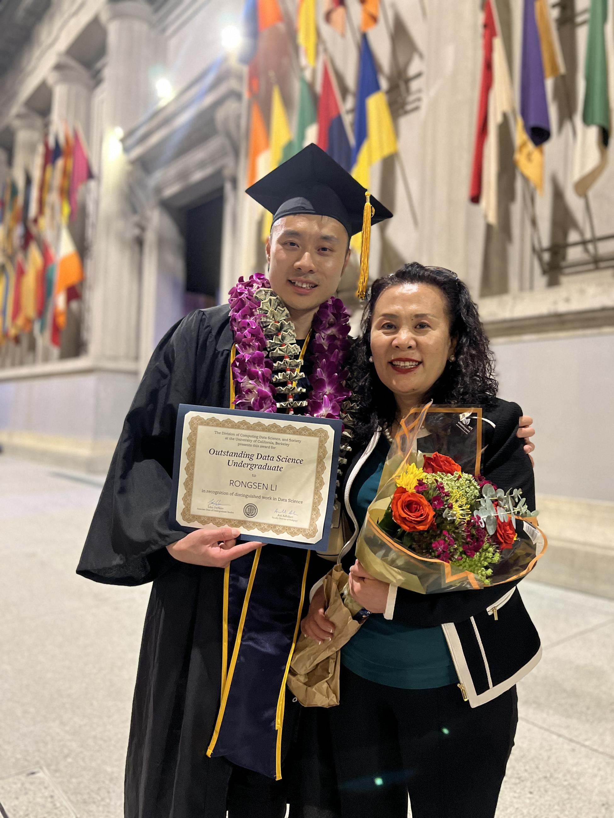 Rongsen Li, recipient of an an Outstanding Data Science Undergraduate award, and his mother at the Data Science commencement on May 18. (Photo/ Yosilu Chen)