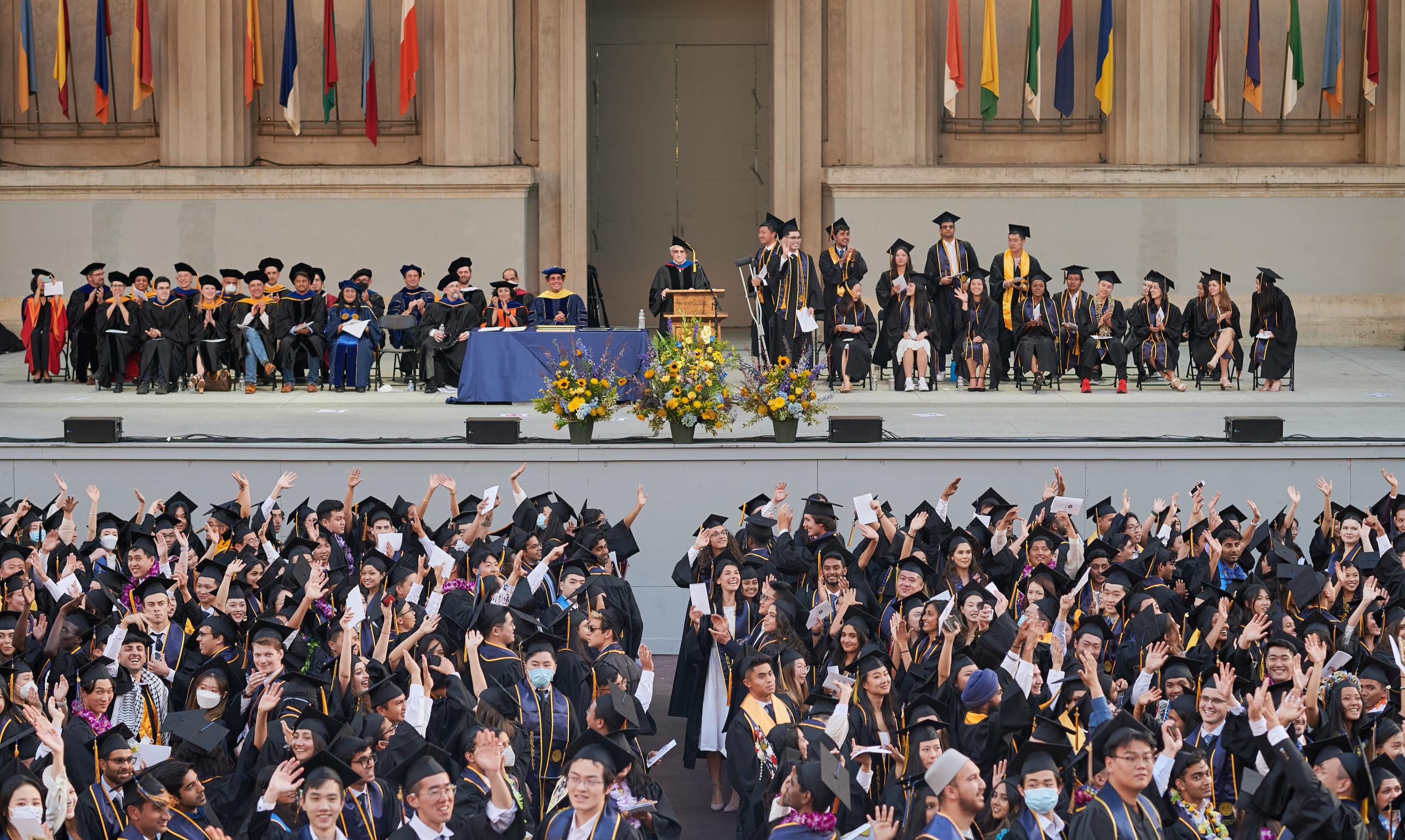 Professor Emeritus David Culler encouraged data science graduates to greet the family and friends supporting them at Hearst Greek Theatre. (Photo/ KLCfotos)