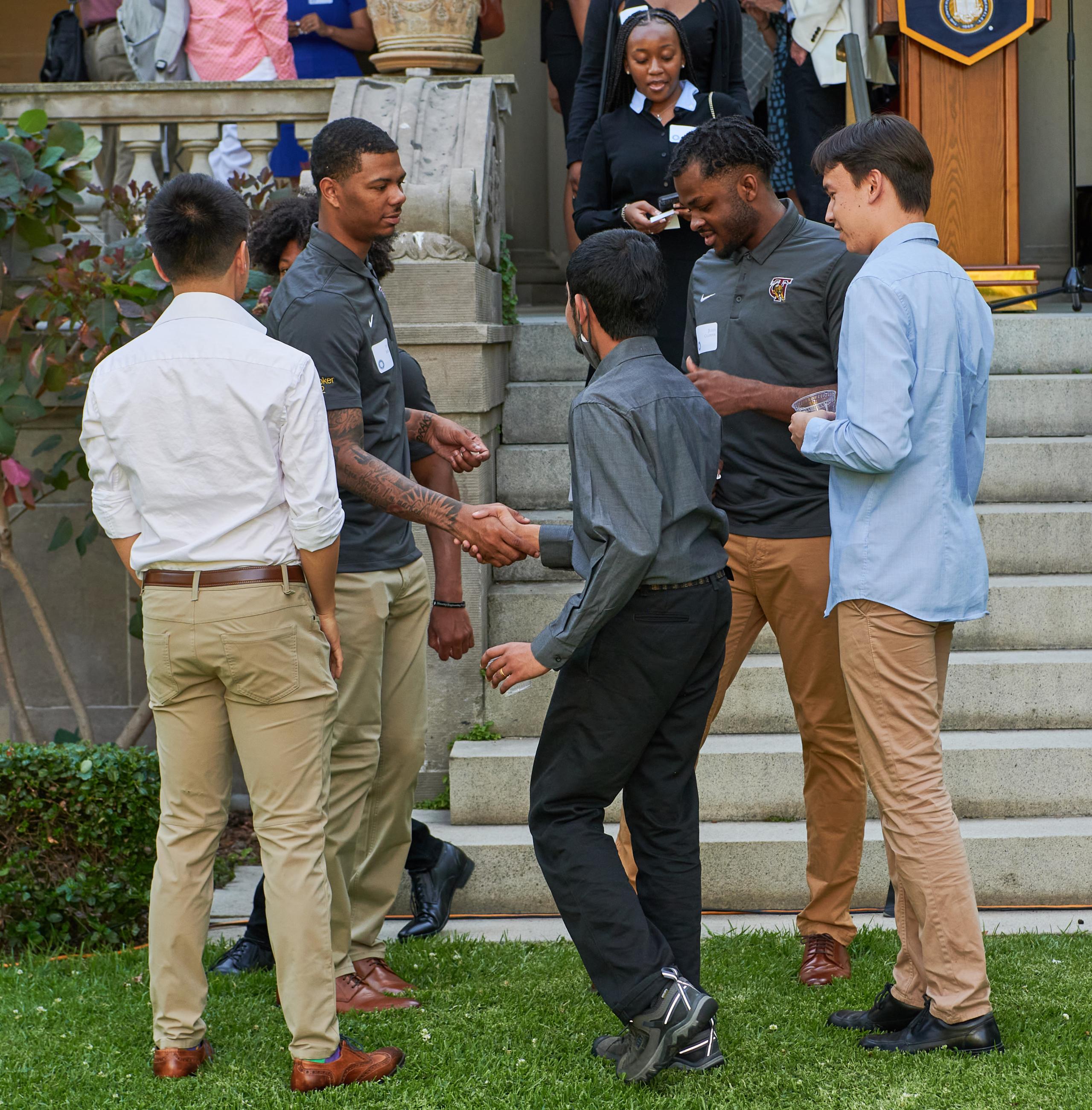 UC Berkeley Lecturer Kevin Miao (front left) and students Vivrd Prasanna (front center) and Oscar Bjorkman (front right) greet Tuskegee Scholars Devin Booker (back left) and Julius Culpepper IV (back right) at the Berkeley-Tuskegee Data Science Initiative Reception.