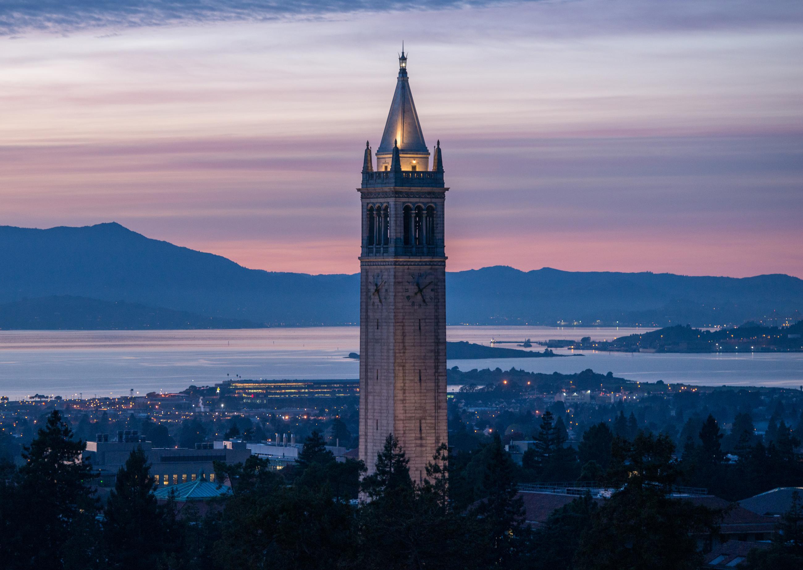 Sather Tower at sunset with a view of the bay. (Photo /Matt Beardsley)