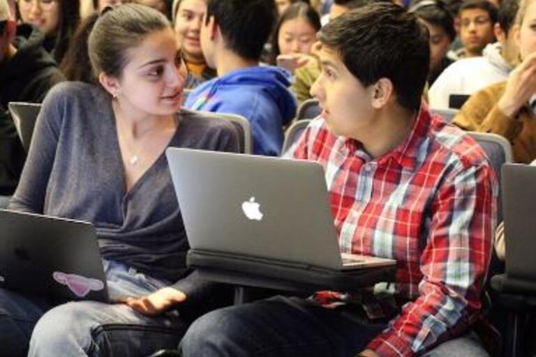 students on their laptops