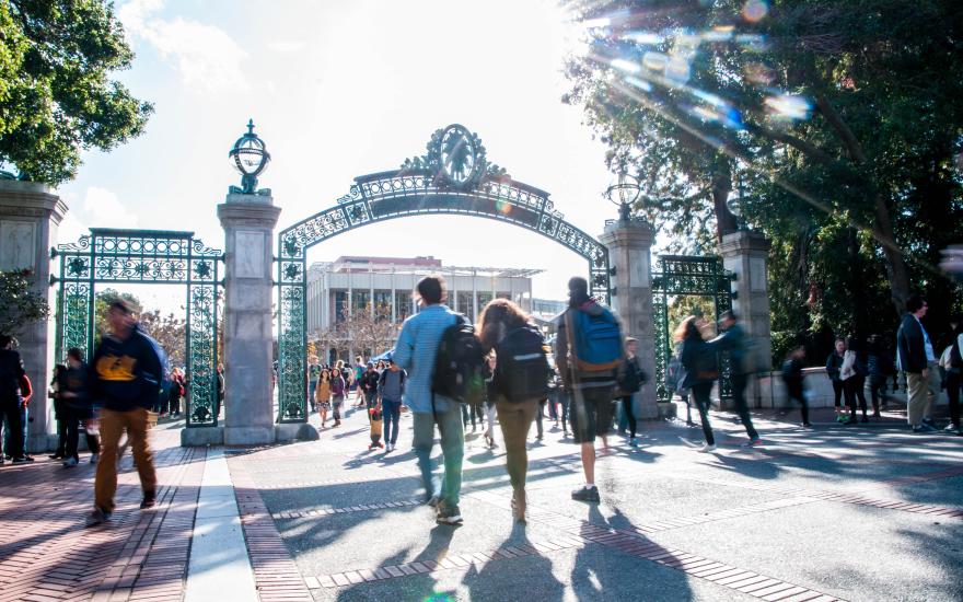 Students walking toward Sather Gate on the Berkeley campus. (Photo /Keegan Houser)