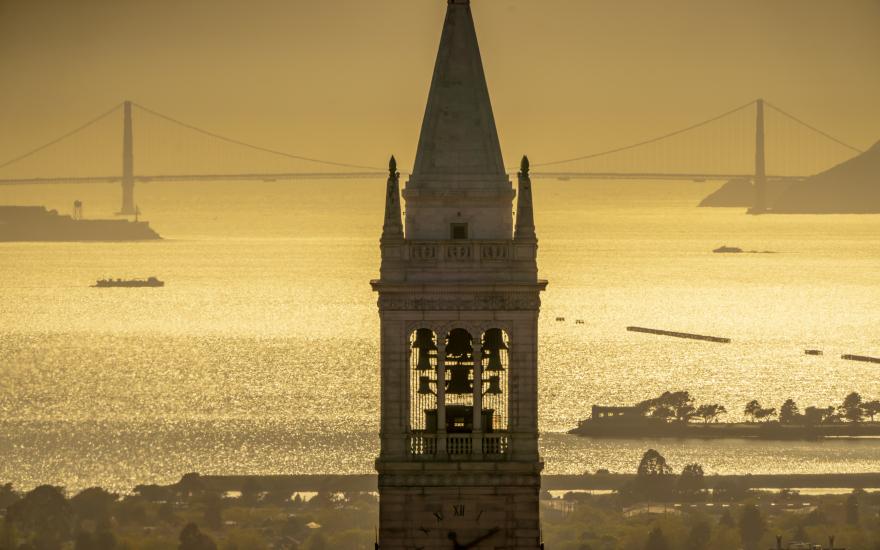 UC Berkeley's Campanile with a golden sunrise over the bay in the background. (Photo /Adam Lau)