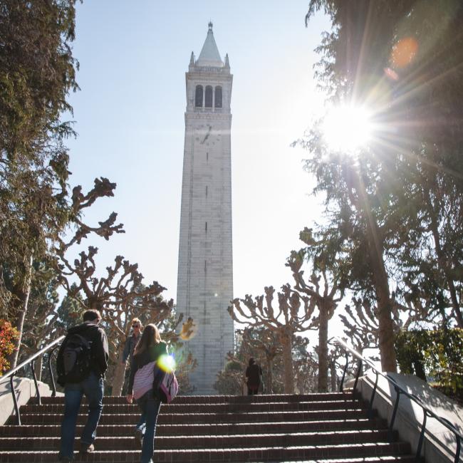 Students walking up the steps to the Campanile on campus. (Photo /Keegan Houser)