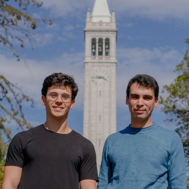 Adam Yala and Ahmed Alaa in front of Sather Tower. (Photo/ Michelle Tran/Berkeley Computing, Data Science, and Society)